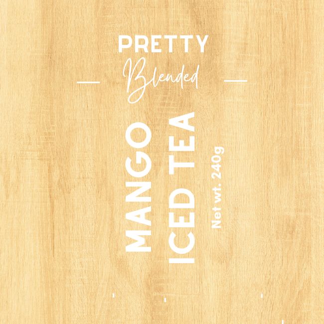 Label for 'Pretty Blended Mango Iced Tea' Candle on a wooden background