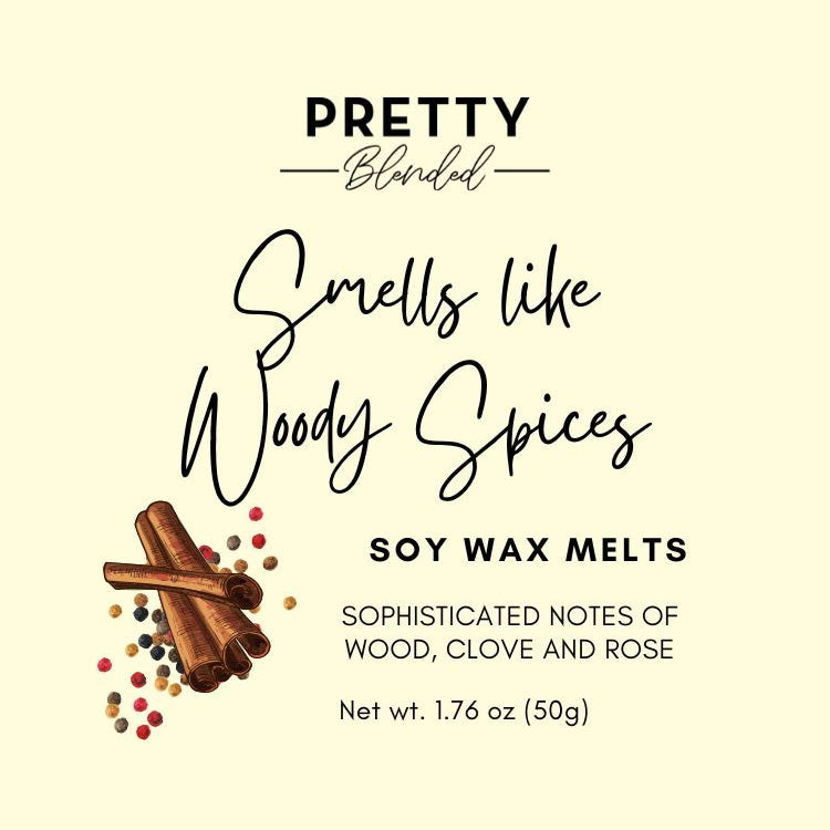 Soy wax melts packaging with Woody Spices title on a beige background