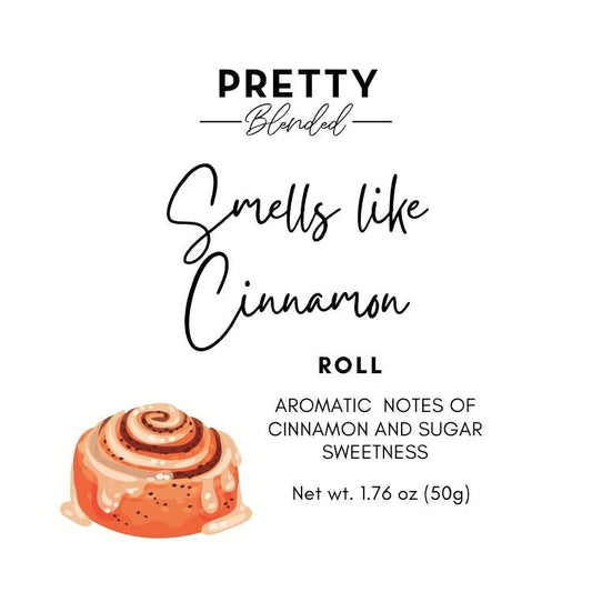 Product label for 'Pretty Blended' cinnamon roll scented soy wax melts with an illustration of a cinnamon roll.