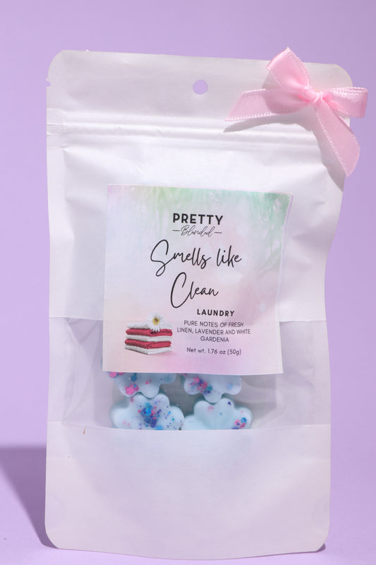Soy wax melts packaging with decorative elements on a purple background