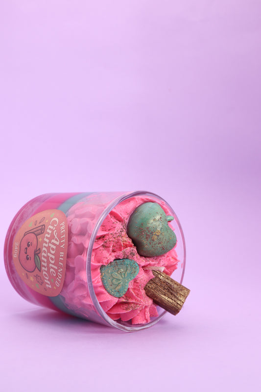 soy wax candle in a glass with apple cinnamon scent